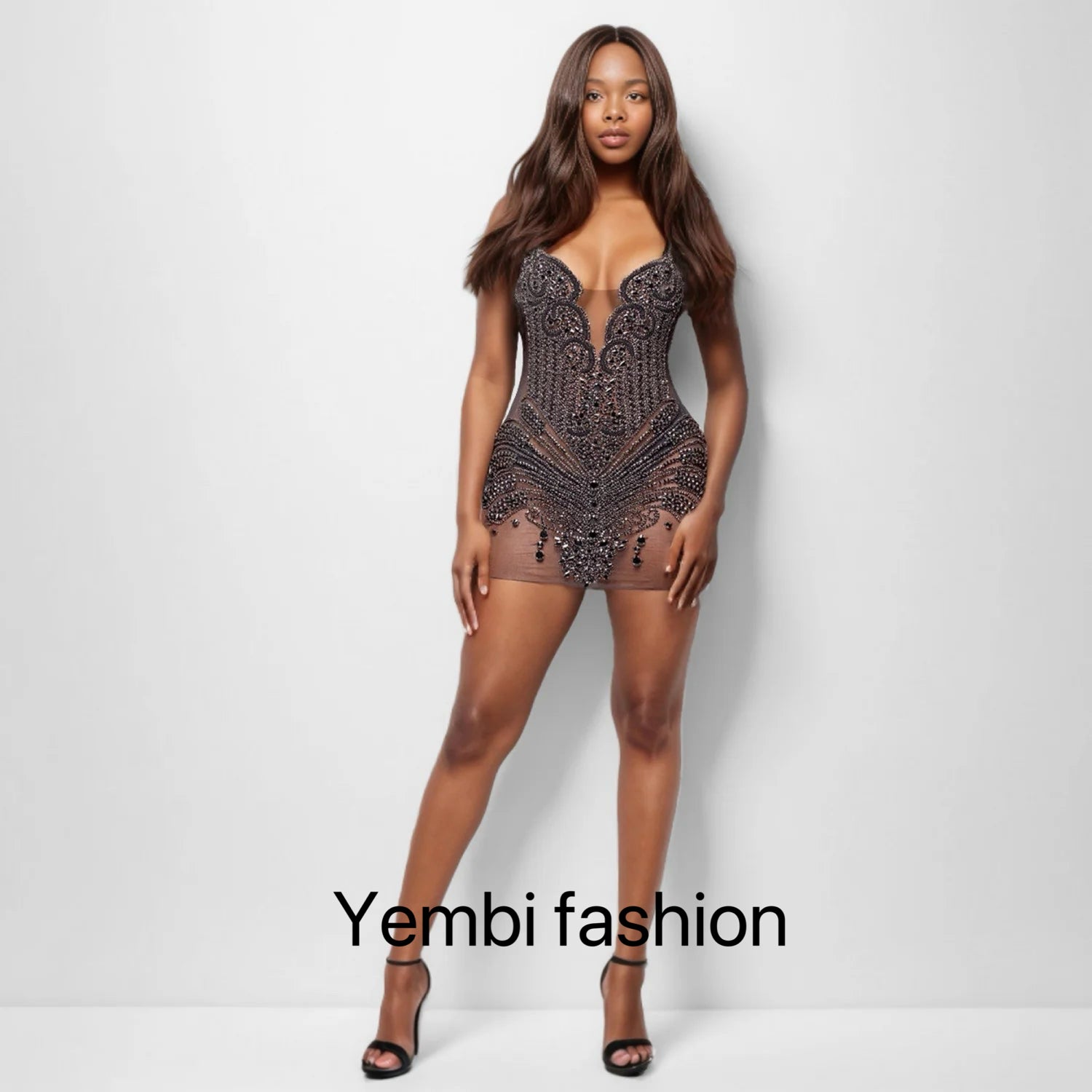 Appliqué mini dress with black rhinestones, featuring intricate detailing and perfect for parties or formal events