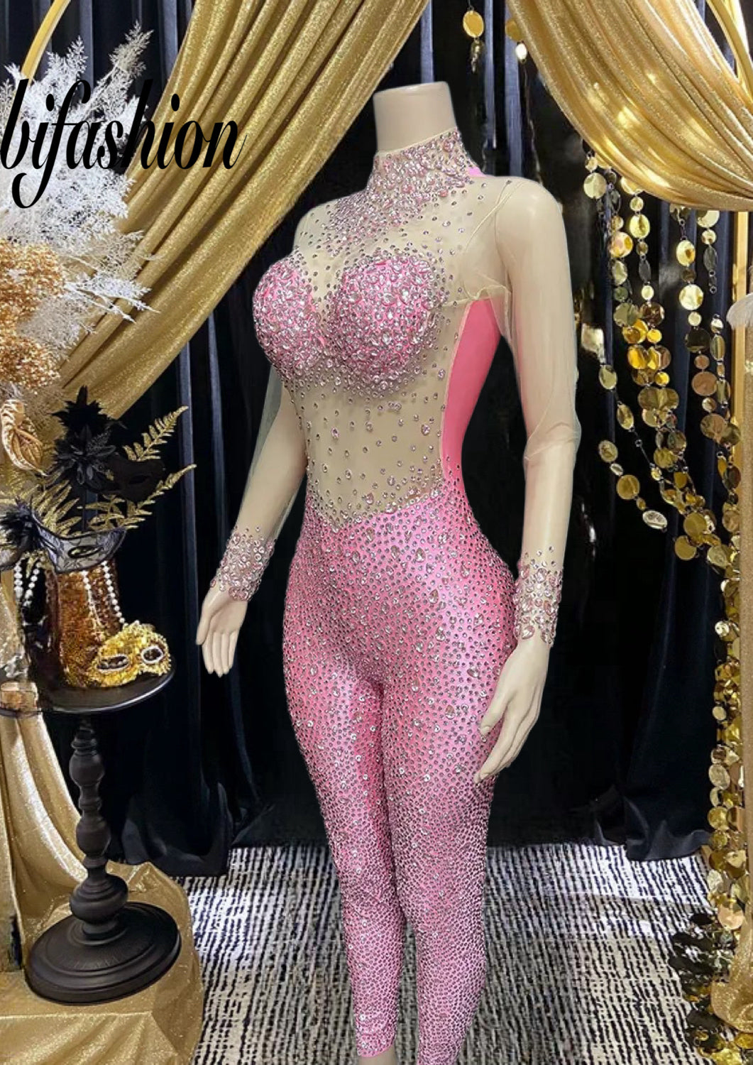 Pink diamante bodysuit with sparkling rhinestones.
