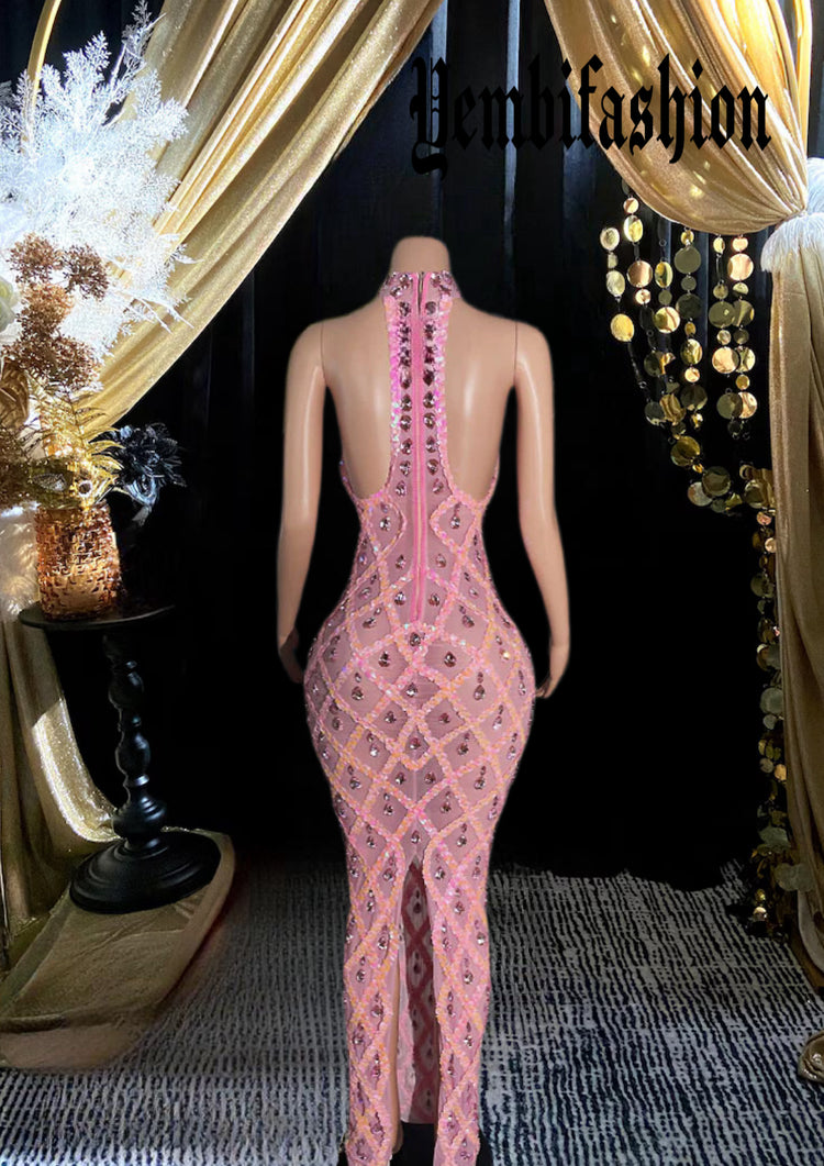 A sleek, form-fitting midnight-dress with sparkling rhinestones, perfect for evening wear and special occasions.