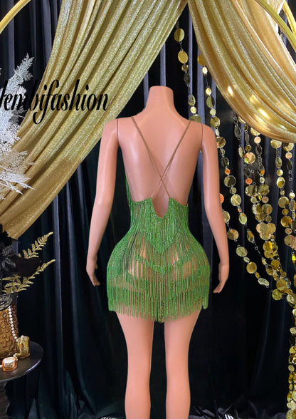 A stunning Vera Mini Tassel Dress with rhinestones and tassel accents, designed for elegance and glamour.