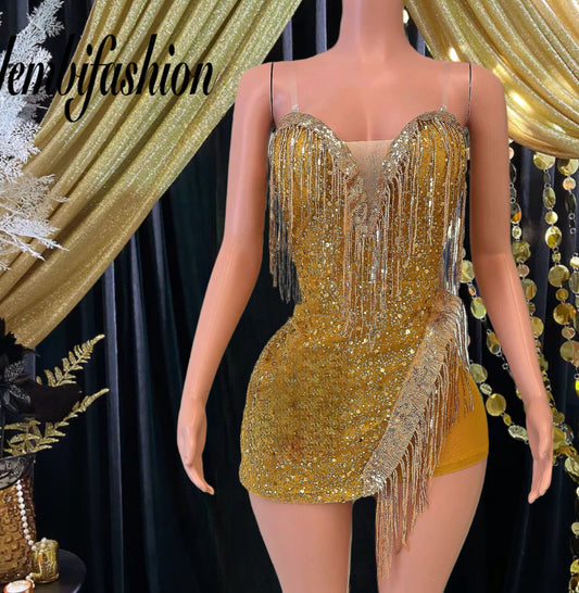 A shimmering mini dress covered in sequins, ideal for parties and special occasions, available online.