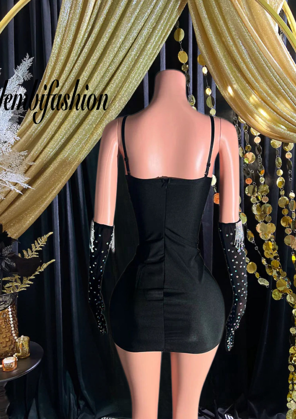 Black Rai Mini Dress Set featuring a modern silhouette and timeless design for versatile styling.