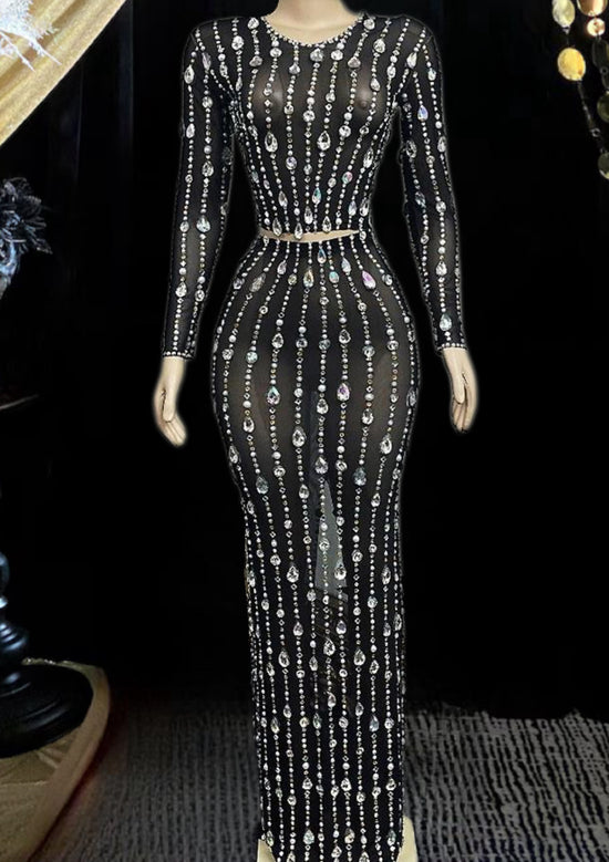 A stylish black mesh dress set featuring long sleeves and a modern, breathable design.