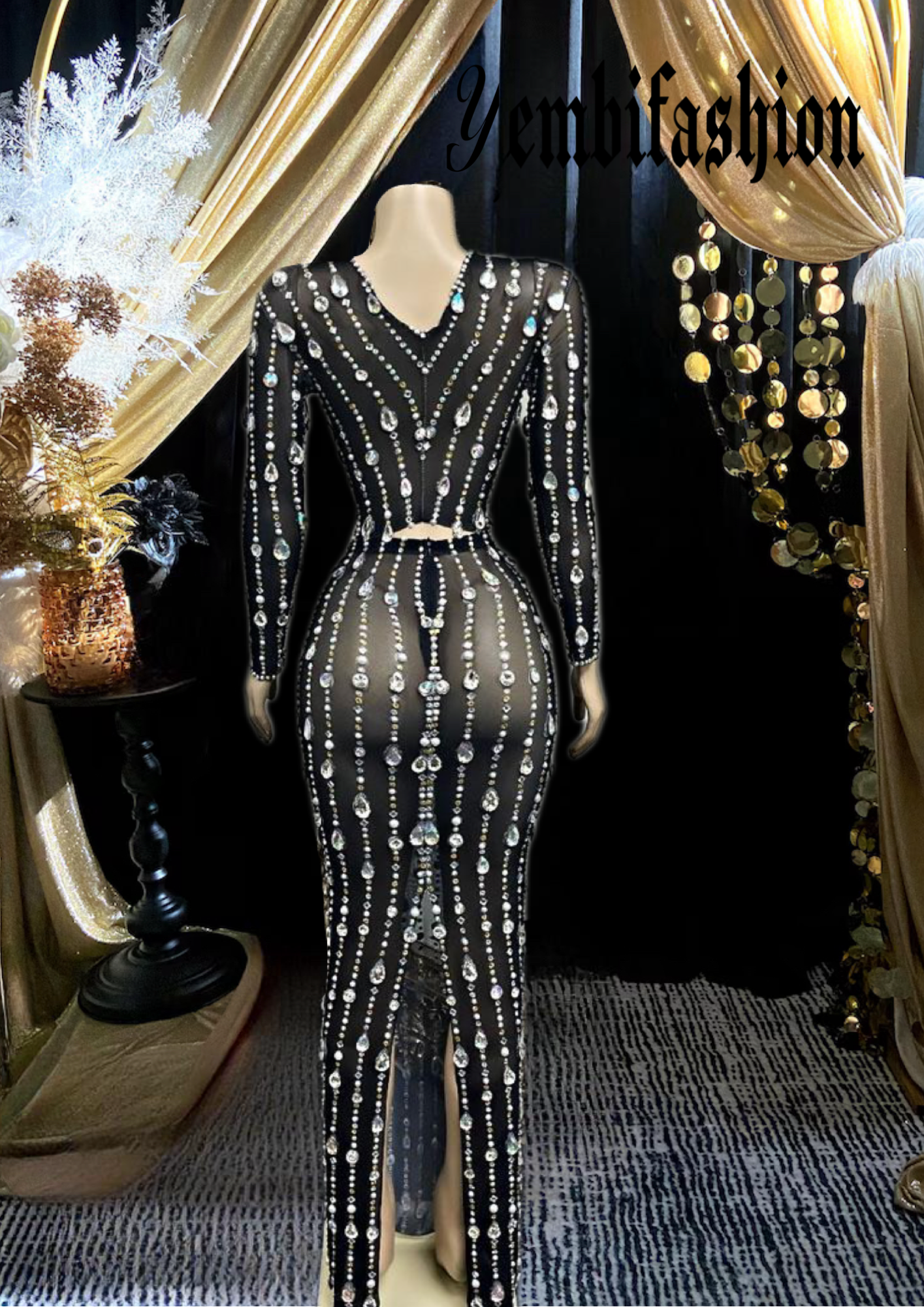 A stylish black mesh dress set featuring long sleeves and a modern, breathable design.