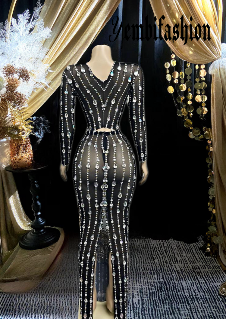 A stylish black mesh dress set featuring long sleeves and a modern, breathable design.