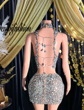 A stylish silver two-piece matching set featuring a sleek design and elegant details for versatile wear.