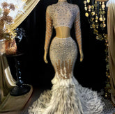 A chic Nina Feather Dress for ladies, featuring white feather detailing, perfect for elegant occasions.