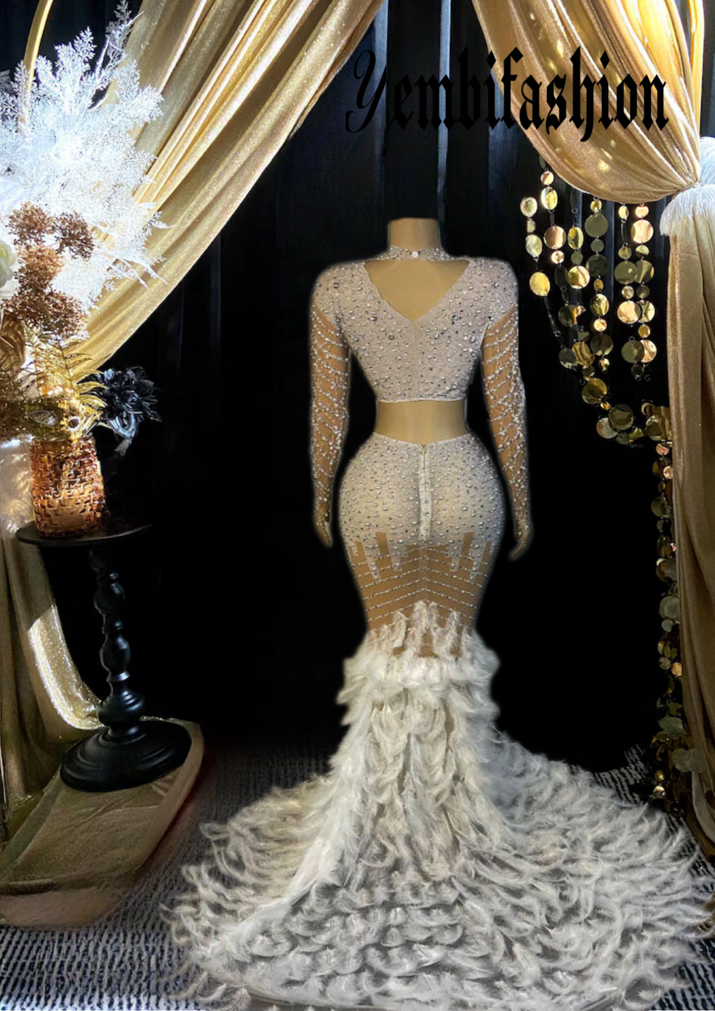 A chic Nina Feather Dress for ladies, featuring white feather detailing, perfect for elegant occasions.