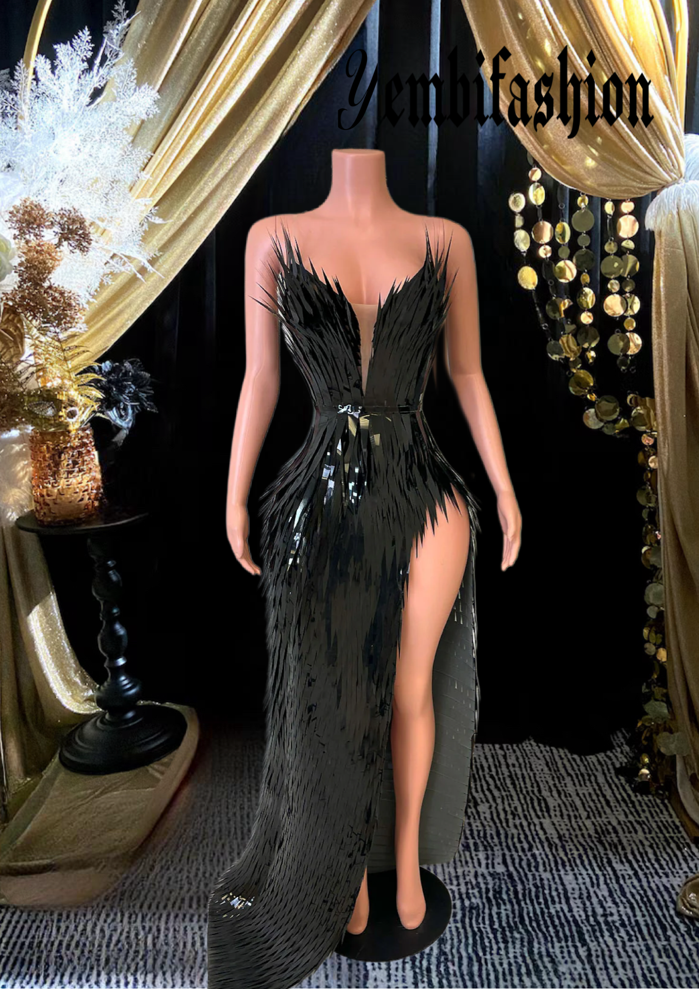 A chic black feather dress perfect for homecoming or as a stylish prom dress, featuring elegant feather details and a sleek silhouette