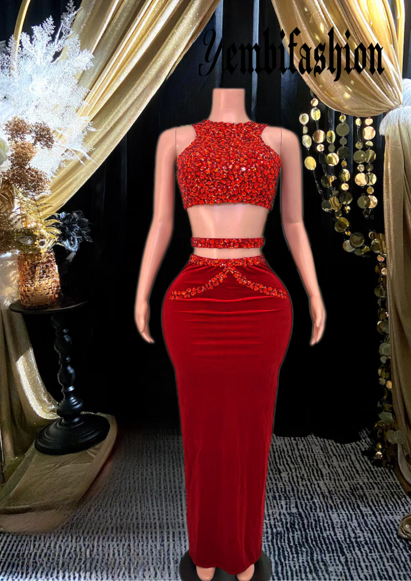 A stylish red skirt set featuring rhinestone detailing, perfect for glamorous occasions.