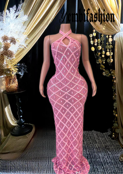 A long sleeveless midi dress adorned with rhinestones, showcasing an elegant and modern design.