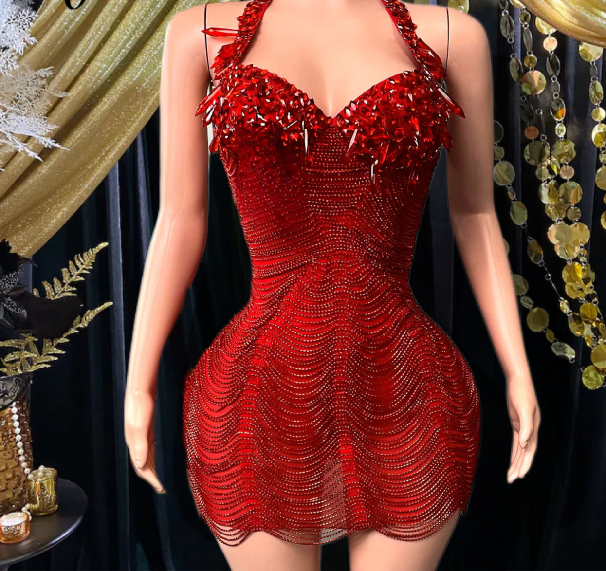 A vibrant Laure Red Mini Dress with tassel detailing, perfect for prom or special occasions