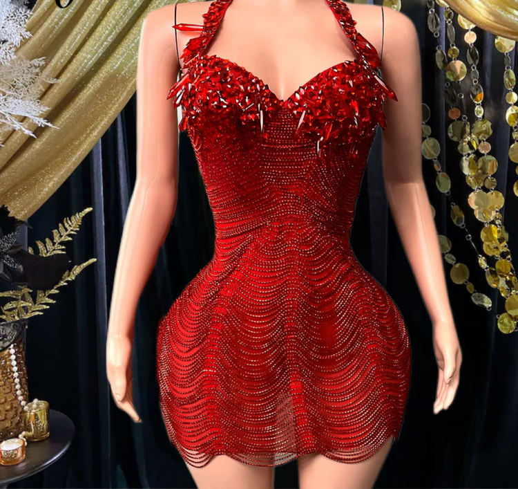 A vibrant Laure Red Mini Dress with tassel detailing, perfect for prom or special occasions