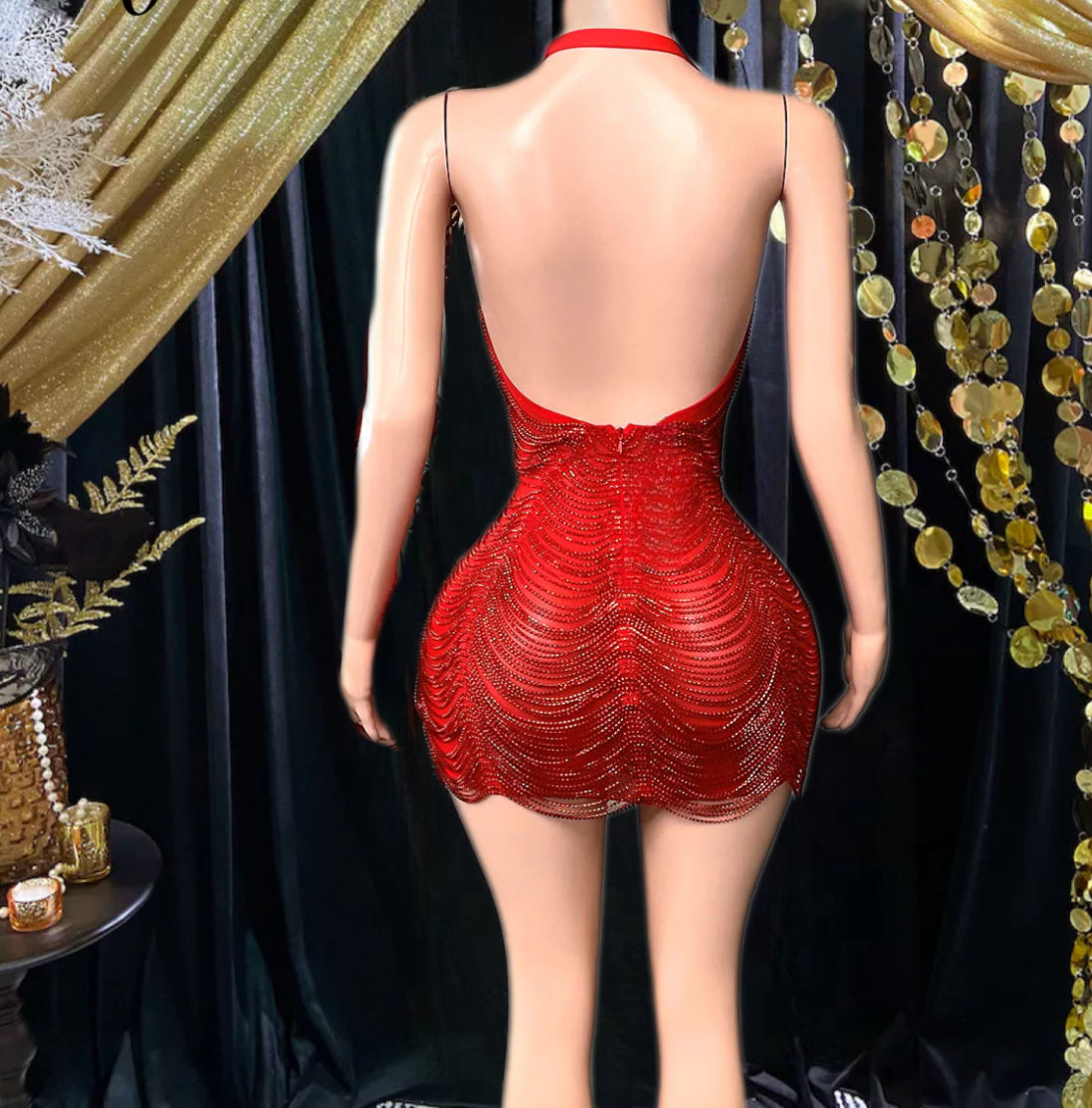 A vibrant Laure Red Mini Dress with tassel detailing, perfect for prom or special occasions
