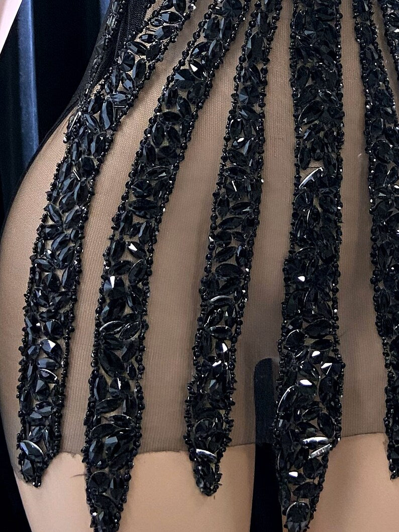 Ella Black Mini Dress featuring a tulle design and rhinestone details for a chic and glamorous look.