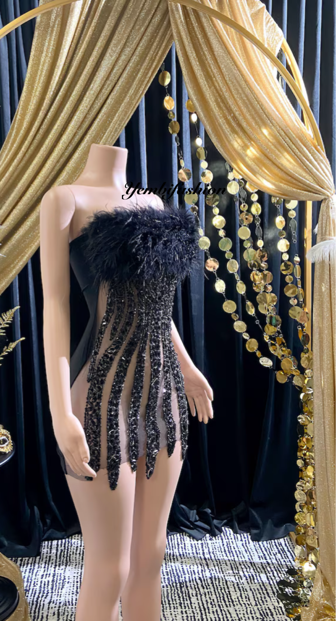 Ella Black Mini Dress featuring a tulle design and rhinestone details for a chic and glamorous look.