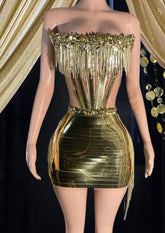 Model wearing a glamorous Rhinestone Dress Set with tassel dress details, perfect for special occasions."