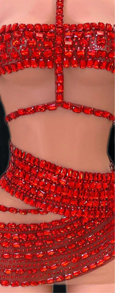 A vibrant red mini dress with crystal and rhinestone detailing, designed for elegant and bold occasions.