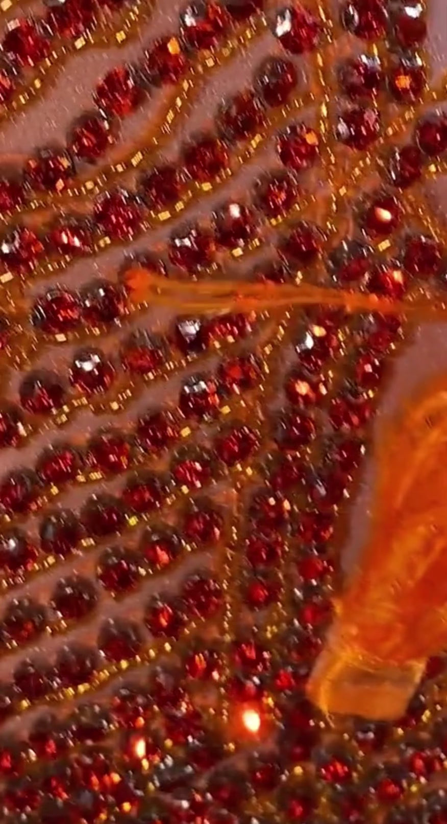 A vibrant Orange Feather Halter Rhinestone Applique Birthday Dress with a halter neckline, feather accents, and sparkling rhinestone applique, ideal for special occasions like birthdays and parties.