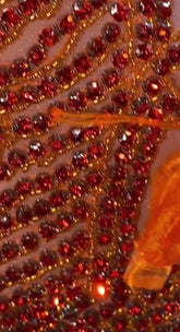 A vibrant Orange Feather Halter Rhinestone Applique Birthday Dress with a halter neckline, feather accents, and sparkling rhinestone applique, ideal for special occasions like birthdays and parties.