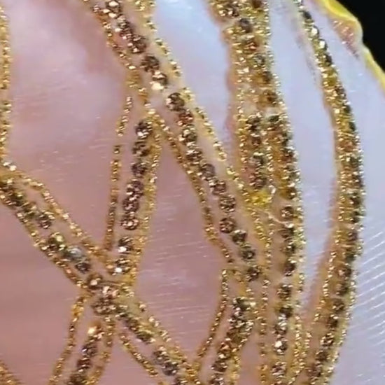 Eve Embellished Mini Dress in Gold with intricate rhinestone detailing, perfect for glamorous events and special occasions."