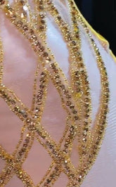 Eve Embellished Mini Dress in Gold with intricate rhinestone detailing, perfect for glamorous events and special occasions."