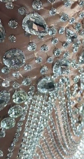 A sparkling Crystal Silver Bling Rhinestone Birthday Dress for ladies, featuring shimmering rhinestones and elegant details, perfect for special occasions.